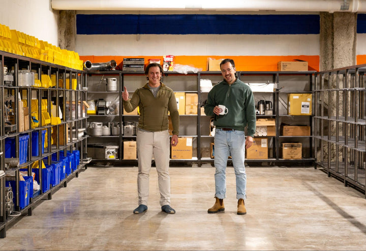 CEO Michael Haft and head of design Joel Shetterly in clean Compass Coffee warehouse